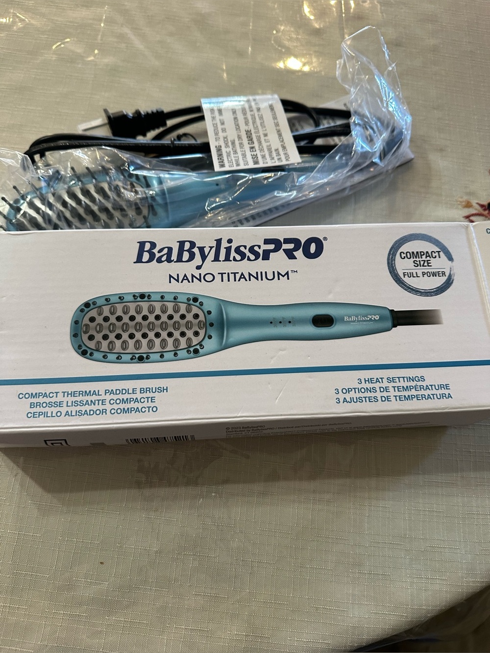 BaBylissPRO Nano Titanium Compact Thermal Paddle Brush in Teal
